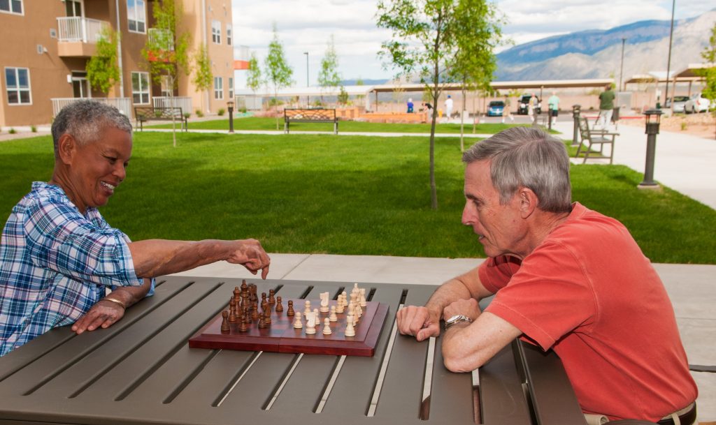 Residents Playing Chess on Patio